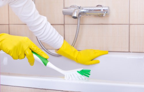 Cleaning staff mopping a high-traffic stairwell area